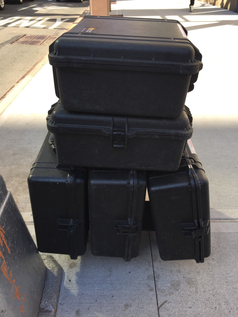 5 Pelican Cases on a skateboard